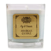 A 5cm square glass soy wax candle in light blue with an engraved bamboo label fig and cassis by bamboo