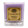 A lavender-colored soy wax candle in a clear 5cm square glass jar labeled bamboo lavender and basil