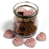 Pink mickey mouse shaped soy wax melts in a clear glass jar with rustic twine and heart tag dark sandalwood scent