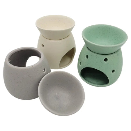 Set of four spa collection stoneware oil burners in beige gray and mint green with matching bowls