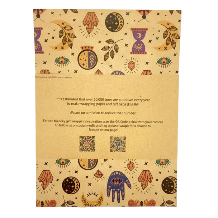 Spellbound recycled kraft wrapping paper in beige with purple orange crystals moons eyes and leaves pattern