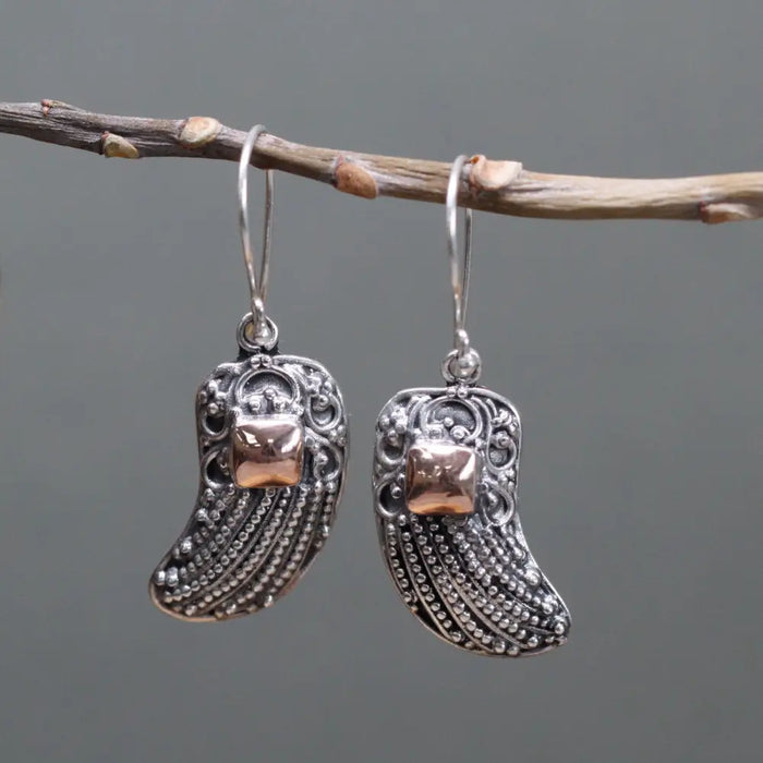 Sterling silver angel wings earrings with intricate filigree and 18ct yellow gold rose gold square accent stone