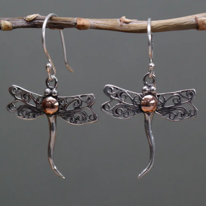 Sterling silver and 18ct yellow gold dragonfly earrings with intricate filigree wings and a copper bead center