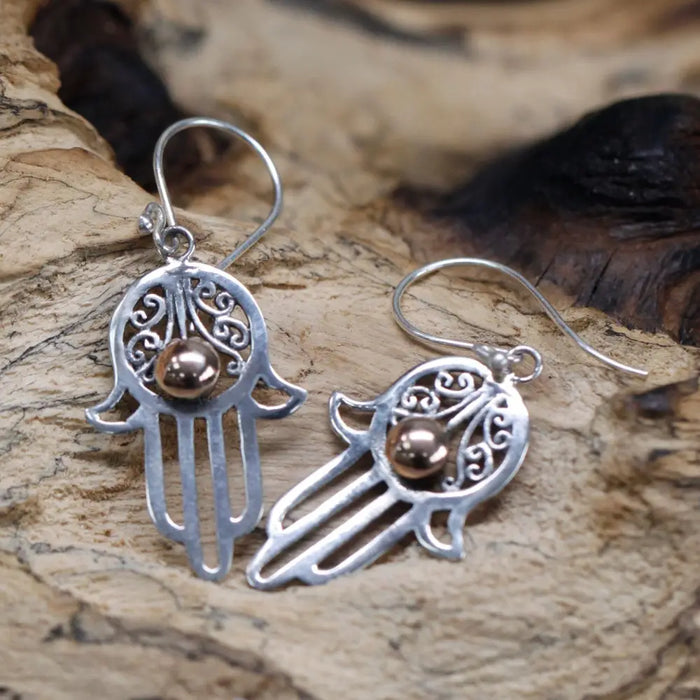 Sterling silver hamsa hand earrings with intricate filigree and a central 18ct yellow gold bronze bead detail