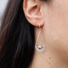 Silver teardrop earring with 18ct yellow gold bead and small silver dots along the lower edge from luna balance