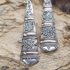 Sterling silver and 18ct yellow gold dangle earrings with floral and geometric patterns and beaded borders