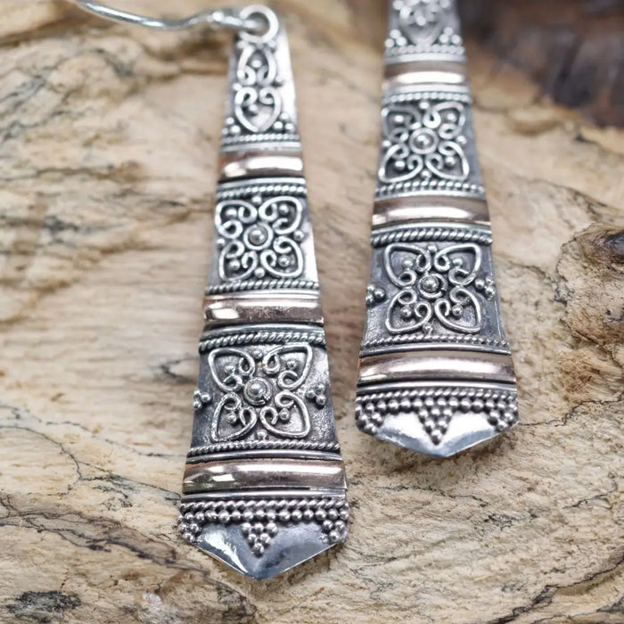 Sterling silver and 18ct yellow gold dangle earrings with floral and geometric patterns and beaded borders