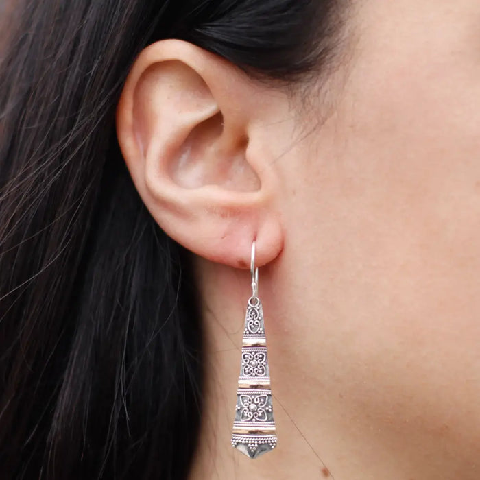 Sterling silver and 18ct yellow gold dangling earrings with intricate floral and geometric patterns and beaded accents