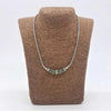 Sterling silver necklace with 18ct yellow gold tribal pattern and delicate filigree segmented centerpiece