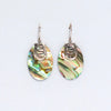 Elegant oval sterling silver earrings with iridescent abalone shell and silver swirl accent
