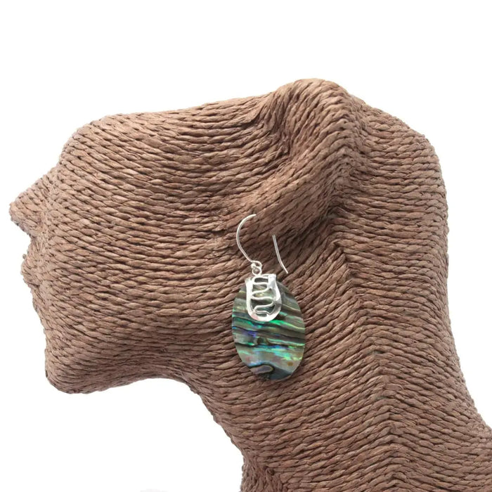 Sterling silver hook earrings with oval abalone shell pendants in green blue and purple swirl design