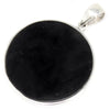 A sleek black onyx pendant with a polished sterling silver frame and bail in a sterling silver abalone tree of life design