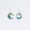 Circular sterling silver classic disc earrings with abalone shell and silver toned filigree detailing