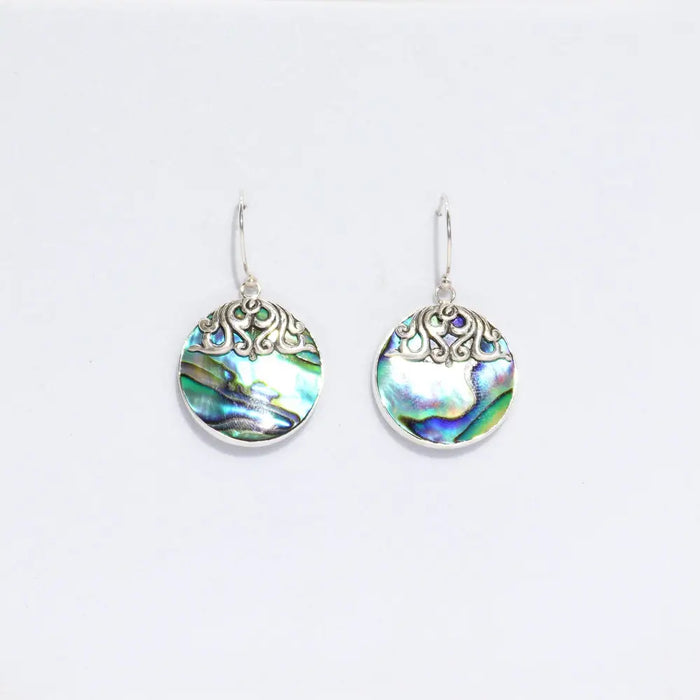 Circular sterling silver classic disc earrings with abalone shell and silver toned filigree detailing
