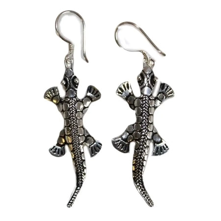 Sterling silver earrings shaped like lizards with textured scales and detailed claws in silver color