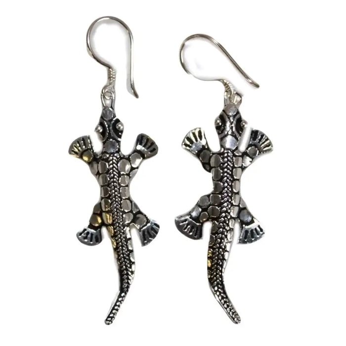Sterling silver earrings shaped like lizards with textured scales and detailed claws in silver color