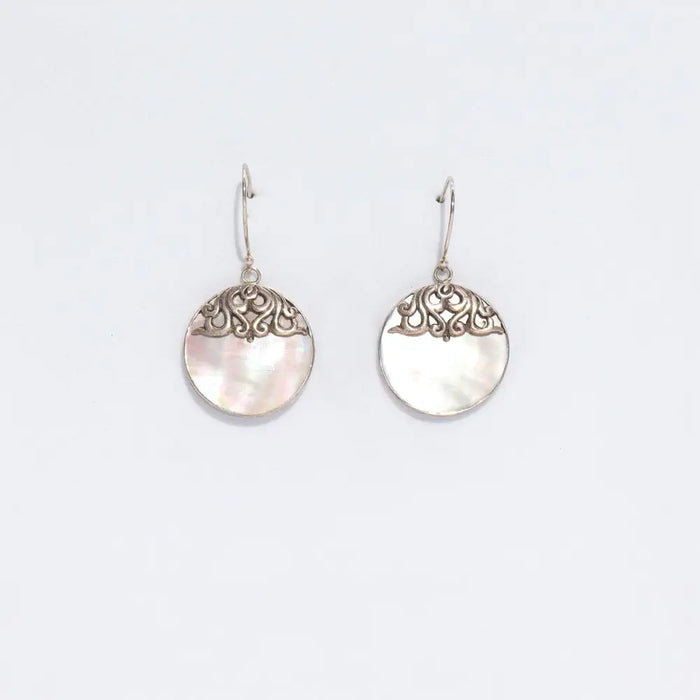 Sterling silver classic disc earrings with circular mother of pearl inlay and detailed filigree scrollwork design