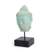 Buddha head figurine in a green-copper finish with an antique stone effect and iron stem.