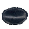 Black oval stone soap dish with natural irregular textured edge and subtle veining made from petrified wood