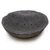 Dark gray stone soap dish with speckled texture and three small drainage holes natural riverstone design