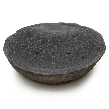 Dark gray stone soap dish with speckled texture and three small drainage holes natural riverstone design
