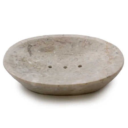 Beige cream marble soap dish oval shape with three drainage holes made from natural stone for bathroom use