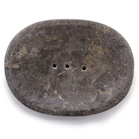 Dark gray oval soap dish with natural stone texture and three drainage holes made of grey marble
