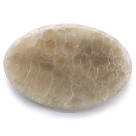 Stone soap dish oval made of smooth translucent beige onyx with natural cracked surface texture