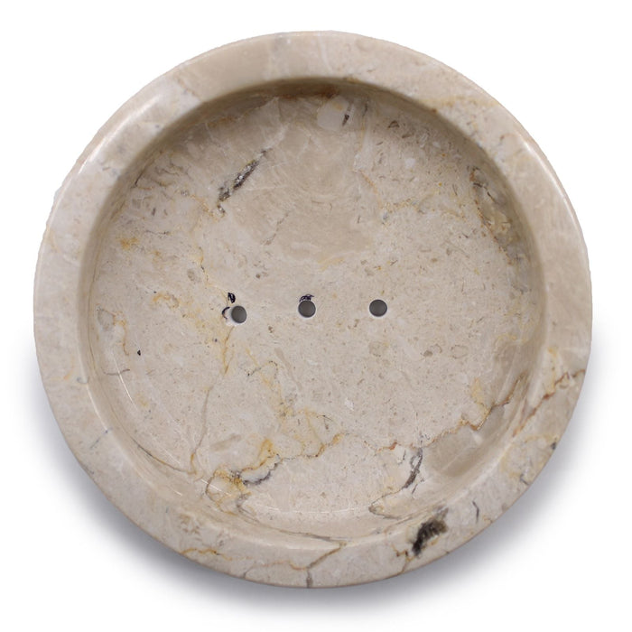 Beige stone soap dish made of honey marble with subtle veining and three drainage holes for bathroom use