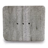 Gray speckled ziolit stone soap dish square shape with three evenly spaced circular holes for drainage