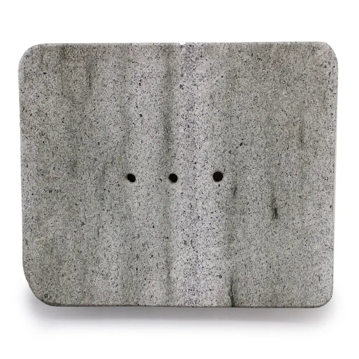 Gray speckled ziolit stone soap dish square shape with three evenly spaced circular holes for drainage