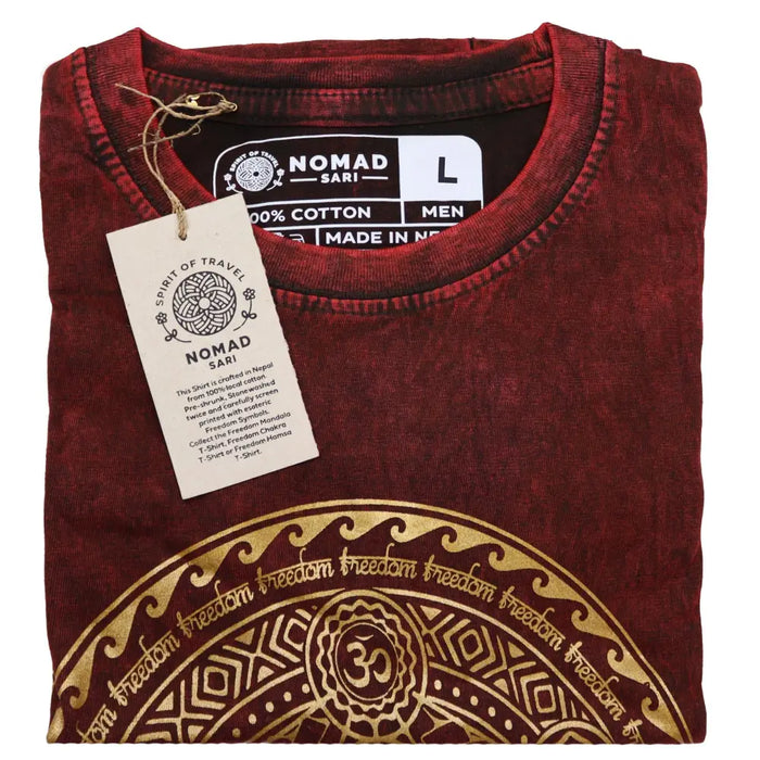A maroon stonewashed cotton t-shirt with a gold and black mandala design featuring freedom around the border