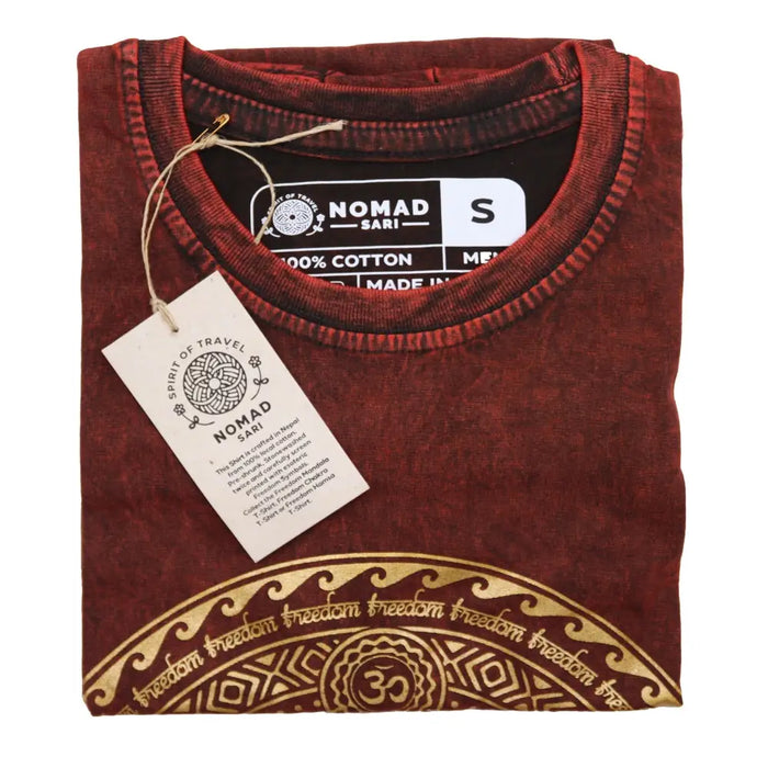 A maroon stonewashed cotton t-shirt with a distressed look and a gold geometric chakra design on the lower front
