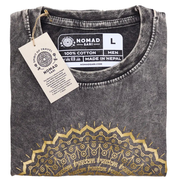 Dark grey stonewashed cotton t-shirt with distressed texture and gold foil mandala design with freedom text along edge