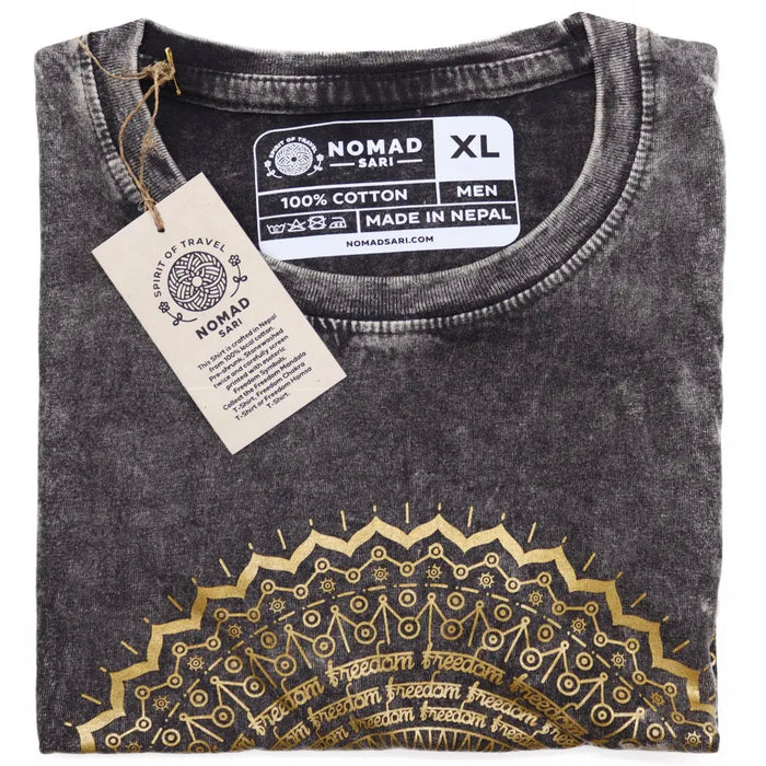 A dark grey stonewashed cotton t-shirt with a gold mandala design and freedom text along the hem in xl size
