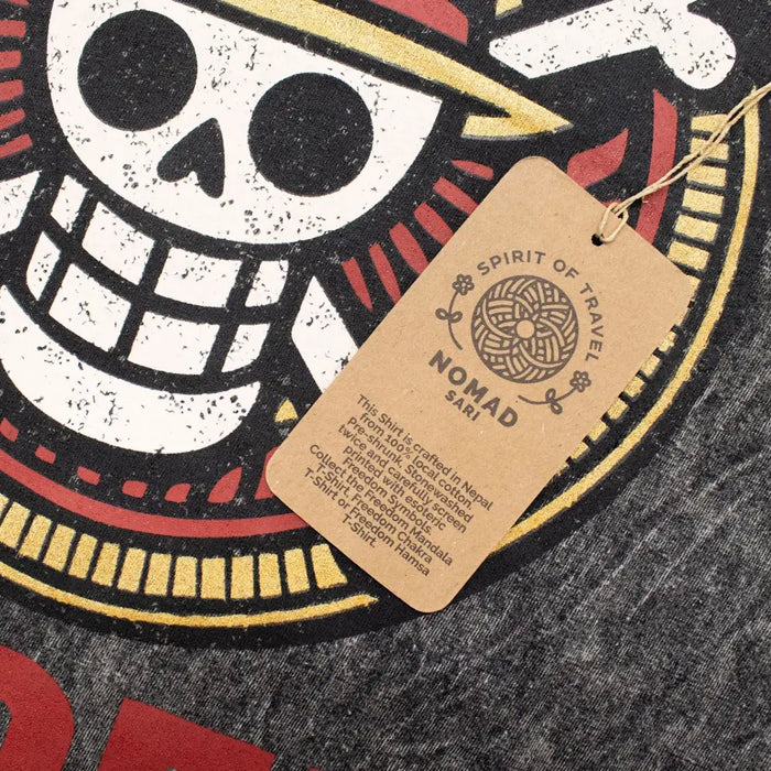 Stonewashed cotton t-shirt in charcoal gray with a distressed skull graphic and red yellow accents in medium size