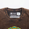 Brown stonewashed cotton t-shirt with a colorful embroidered sun and zodiac design at the bottom hem in large size