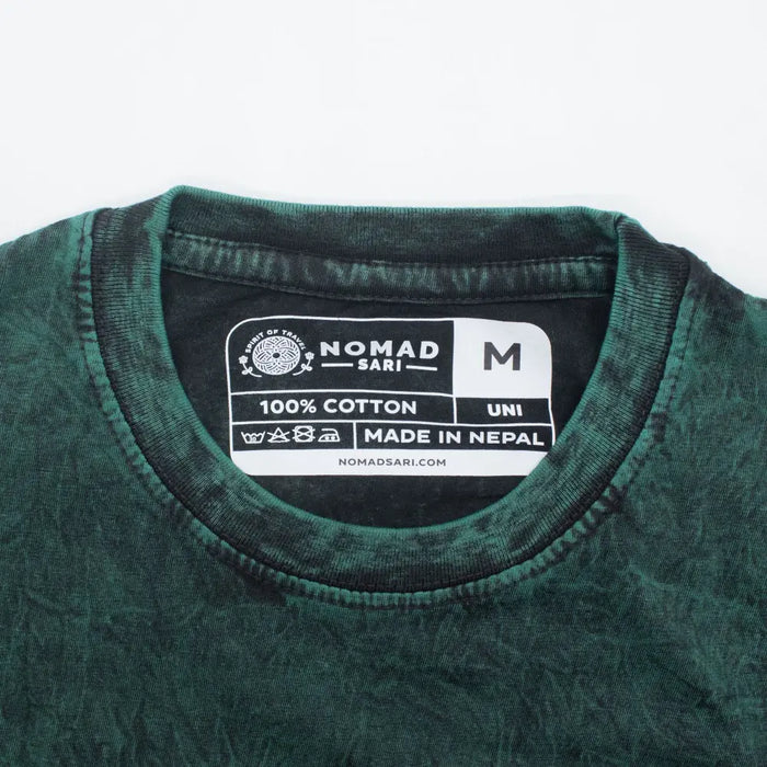 Stonewashed cotton dark green unisex t-shirt with a faded textured finish and black ribbed crew neck in medium size