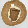 Beige woven straw sun hat with soft flexible inner band from coffee and daisies collection