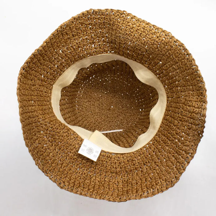 A woven tan straw sun hat with a soft beige fabric band in natural coffee color