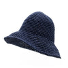 Navy blue woven straw sun hat with bucket shape made from straw sun material for outdoor use