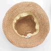 Beige woven straw sun hat with a soft scalloped-edge rose blush fabric band for sun protection