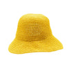 A vibrant yellow straw sun hat with a textured crocheted pattern and a wide brim for sun protection