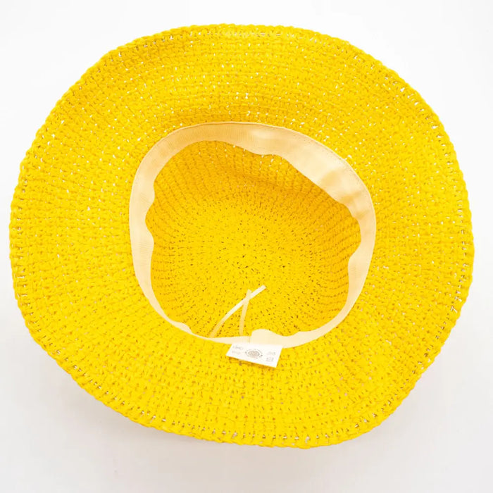 Bright yellow straw sun hat with a soft beige inner band woven from straw sun material