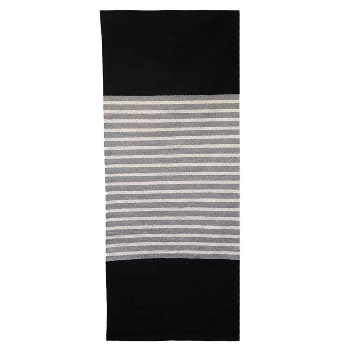 Black and gray striped woven indian cotton rug with solid black borders and soft cotton texture