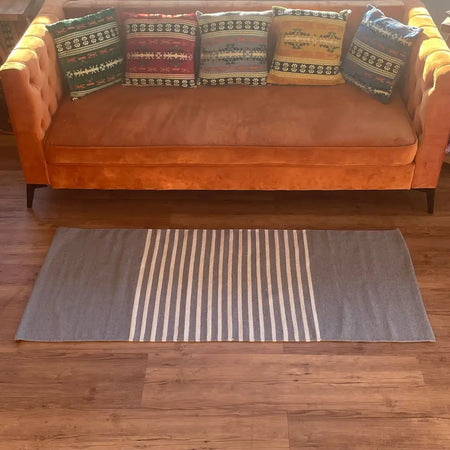 Gray and white striped rectangular cotton rug made from indian cotton for living room or hallway use