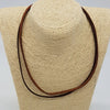 Brown suede leather cord necklace with sterling silver fittings and a brown leather neck strap