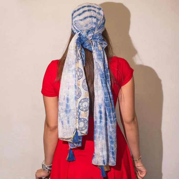 Blue and white patterned summer scarf with tassels made of light fabric ideal for warm weather wear