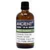 A brown glass bottle of sweet almond organic base oil with black cap and allergen declarations on the label