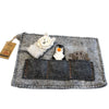 Gray felt tablet pouch with finger puppets showing embroidered sheep penguin and walrus designs